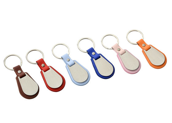 O plutônio do logotipo de Debossed cobre o suporte chave de revestimento do metal da borda do Keyring da corrente chave