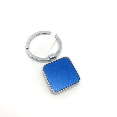 Porta-chaves de metal azul de prata dentro do pacote individual de polibag