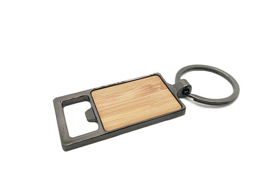 O abridor de garrafa de bambu do metal personalizou o Keyring da cor do preto da arma da corrente chave do laser