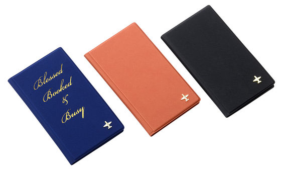 Bom preço Padrão de tecido personalizado de couro PU Porta passaporte de viagem resistente à água 4 slots de cartão Janela de identificação on-line