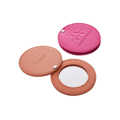 Bom preço Espelho compacto redondo de couro PU dobrável 1X 2X de ampliação com impressão de logotipo on-line
